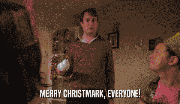 Mark Corrigan from Peep Show holding a gravy boat and saying 'Merry Christmark, everyone!'