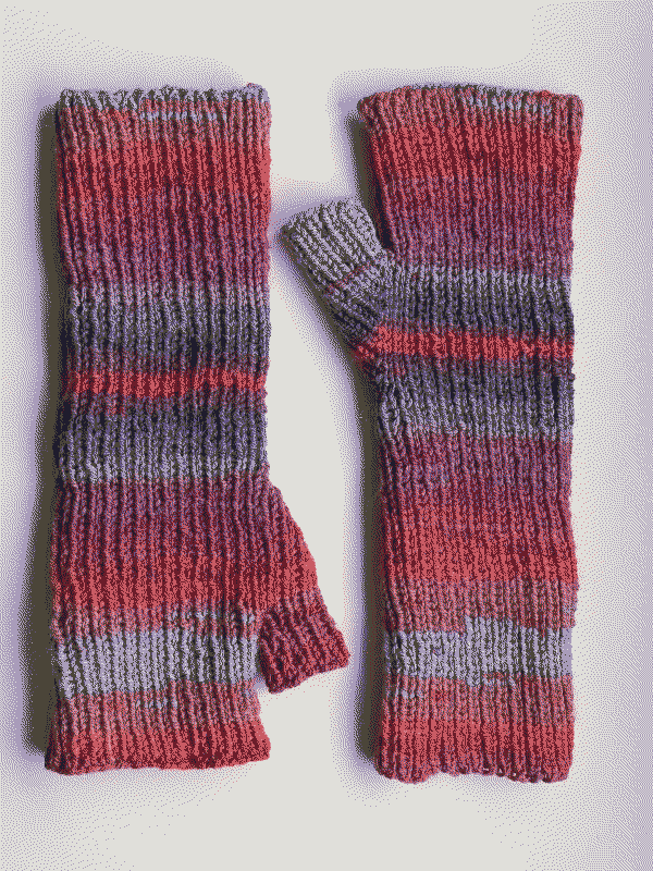 Two knitted, ribbed wristwarmers in variegrated dusk colours